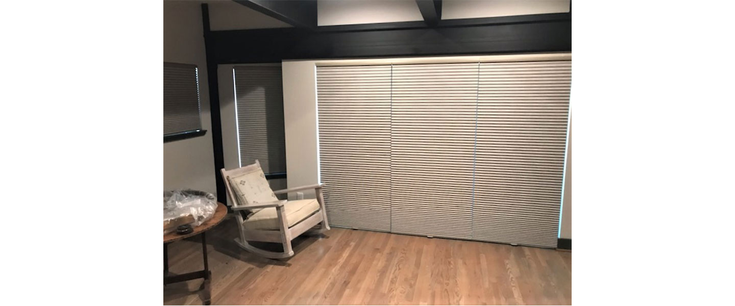 Chair near window curtain