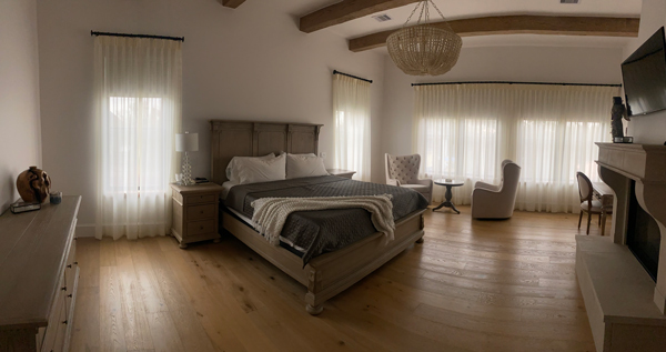 Drapes installed for a bedroom of a house in Houston, TX